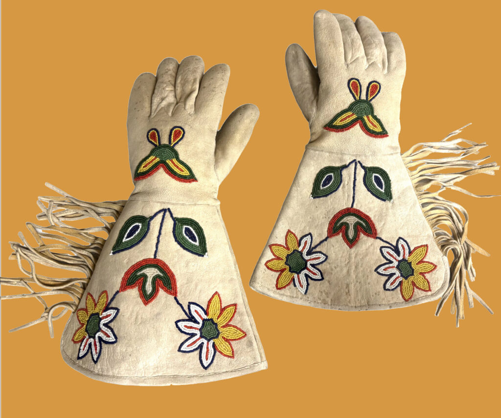 Artist Once Known (Ute), Beaded Gauntlets, date unknown, buckskin and seed beads. CSWS permanent collection, 1963:07007